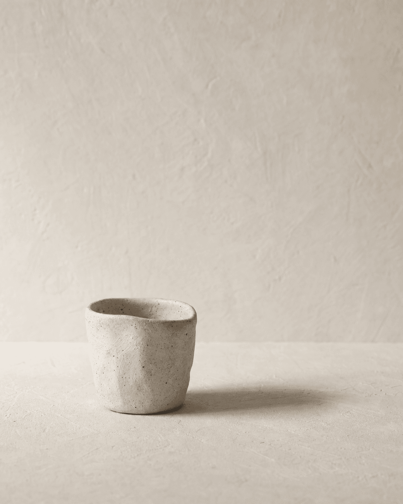 stone cup, speckled bone stoneware